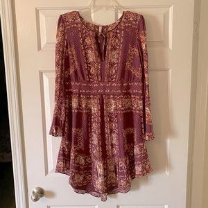 Free People floral dress with flared sleeve and ruffle skirt